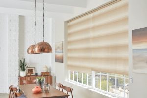 Motorized roller shades in a dining area