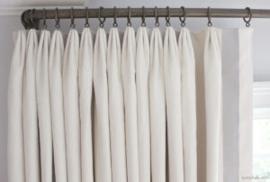 French pleat curtains in a living room